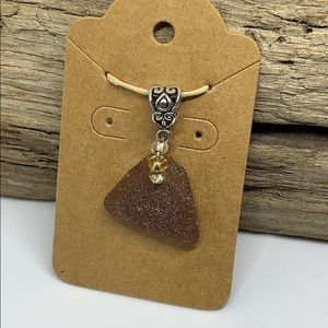Brown sea glass pendant
